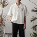 Cafe Crop Boxy Embroidered Linen Polo